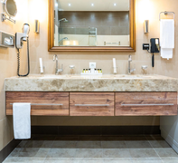 Floating double-sink vanity with wood drawers